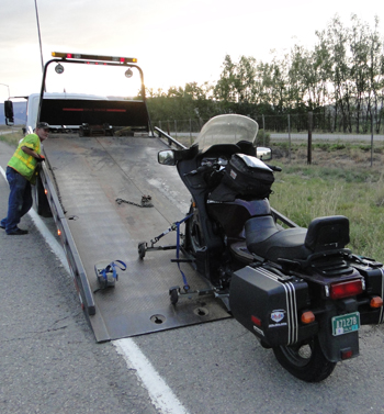 Concours being pulled onto tow truck